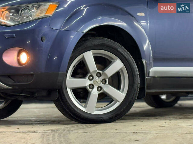 Синий Мицубиси Аутлендер, объемом двигателя 2 л и пробегом 228 тыс. км за 7999 $, фото 11 на Automoto.ua