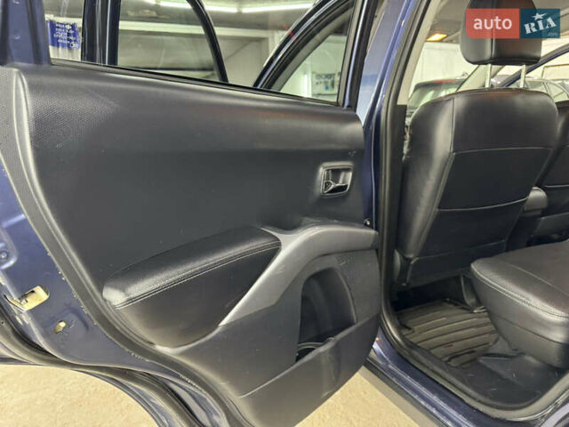 Синий Мицубиси Аутлендер, объемом двигателя 2 л и пробегом 228 тыс. км за 7999 $, фото 41 на Automoto.ua