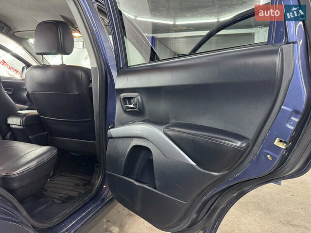 Синий Мицубиси Аутлендер, объемом двигателя 2 л и пробегом 228 тыс. км за 7999 $, фото 38 на Automoto.ua