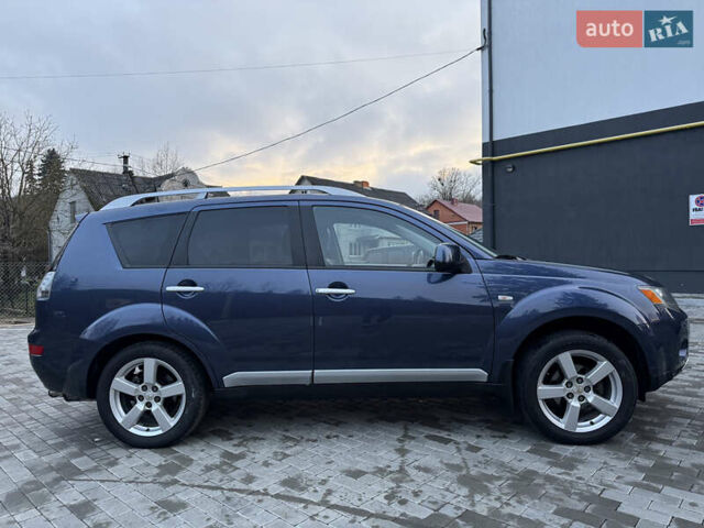 Синий Мицубиси Аутлендер, объемом двигателя 2 л и пробегом 228 тыс. км за 8888 $, фото 11 на Automoto.ua