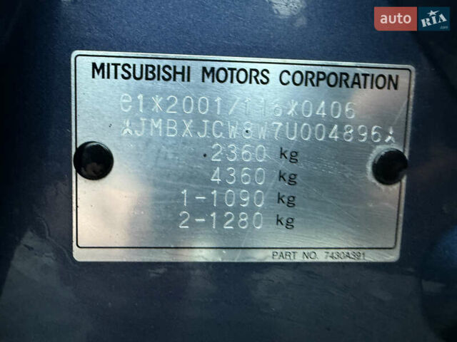 Синий Мицубиси Аутлендер, объемом двигателя 2 л и пробегом 228 тыс. км за 8888 $, фото 53 на Automoto.ua