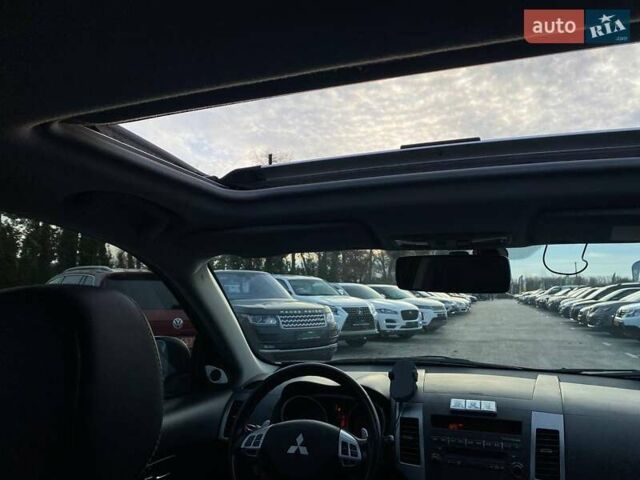 Синій Міцубісі Аутлендер, об'ємом двигуна 2.36 л та пробігом 282 тис. км за 9490 $, фото 43 на Automoto.ua