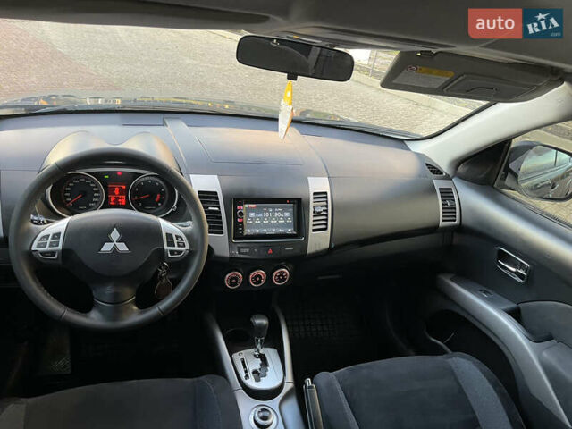 Міцубісі Аутлендер 2008 у Хусте на Automoto.ua Синій Міцубісі Аутлендер, об'ємом двигуна 2.4 л та пробігом 246 тис. км за 7950 $, фото 8 на Automoto.ua