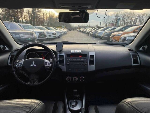 Синий Мицубиси Аутлендер, объемом двигателя 2.4 л и пробегом 282 тыс. км за 9490 $, фото 22 на Automoto.ua