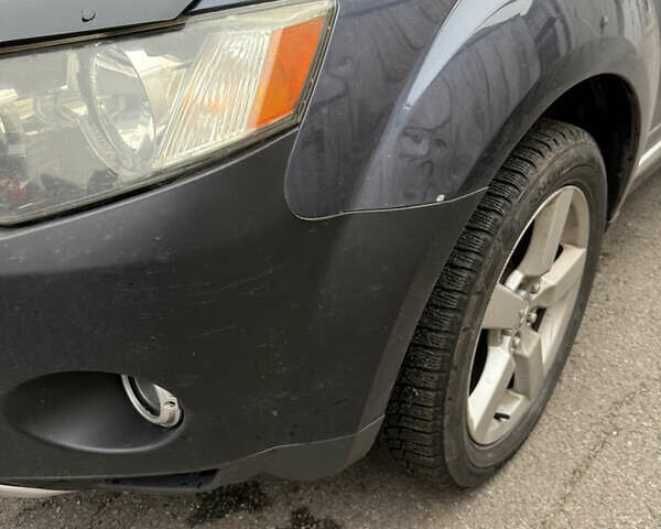 Синий Мицубиси Аутлендер, объемом двигателя 2.36 л и пробегом 269 тыс. км за 7500 $, фото 3 на Automoto.ua