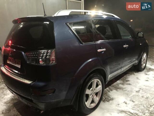 Синий Мицубиси Аутлендер, объемом двигателя 3 л и пробегом 340 тыс. км за 9555 $, фото 4 на Automoto.ua