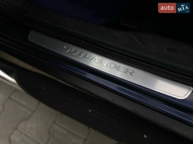 Синій Міцубісі Аутлендер, об'ємом двигуна 2.36 л та пробігом 282 тис. км за 9490 $, фото 21 на Automoto.ua