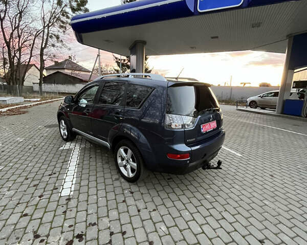 Синий Мицубиси Аутлендер, объемом двигателя 2 л и пробегом 263 тыс. км за 8900 $, фото 19 на Automoto.ua