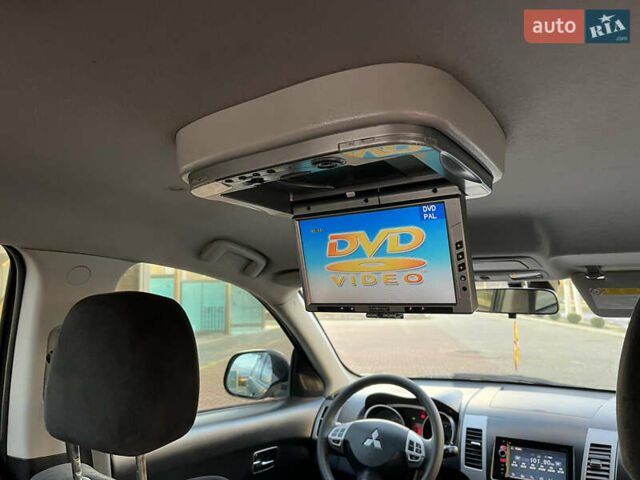 Міцубісі Аутлендер 2008 у Хусте на Automoto.ua Синій Міцубісі Аутлендер, об'ємом двигуна 2.4 л та пробігом 246 тис. км за 7950 $, фото 11 на Automoto.ua