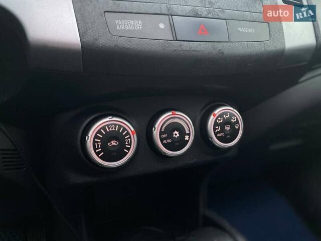 Синій Міцубісі Аутлендер, об'ємом двигуна 2.36 л та пробігом 282 тис. км за 9490 $, фото 38 на Automoto.ua