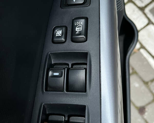 Синий Мицубиси Аутлендер, объемом двигателя 2 л и пробегом 263 тыс. км за 8900 $, фото 29 на Automoto.ua