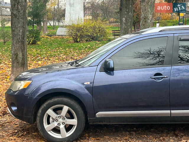Синій Міцубісі Аутлендер, об'ємом двигуна 2.4 л та пробігом 211 тис. км за 8390 $, фото 5 на Automoto.ua