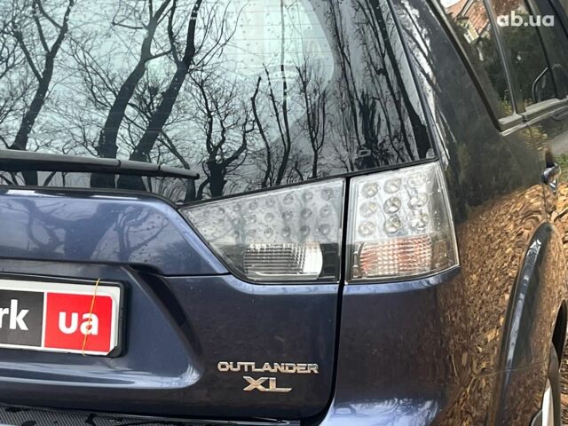 Синій Міцубісі Аутлендер, об'ємом двигуна 2.4 л та пробігом 211 тис. км за 8390 $, фото 10 на Automoto.ua