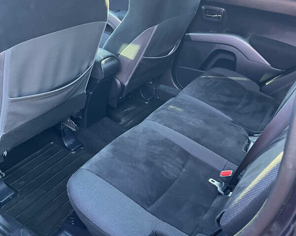 Синий Мицубиси Аутлендер, объемом двигателя 2 л и пробегом 263 тыс. км за 8900 $, фото 24 на Automoto.ua