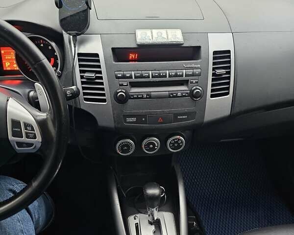 Синій Міцубісі Аутлендер, об'ємом двигуна 2.4 л та пробігом 282 тис. км за 10500 $, фото 3 на Automoto.ua