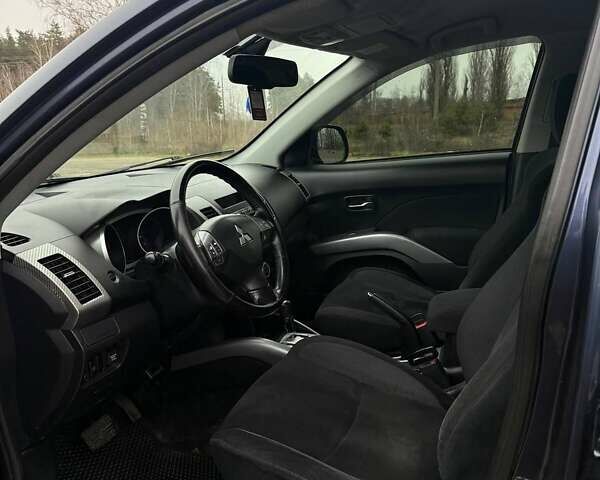 Синий Мицубиси Аутлендер, объемом двигателя 2.4 л и пробегом 211 тыс. км за 7800 $, фото 16 на Automoto.ua