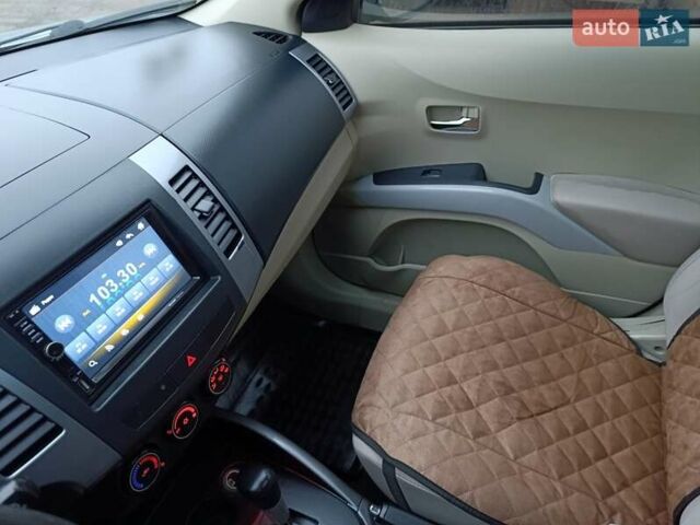 Синий Мицубиси Аутлендер, объемом двигателя 2.4 л и пробегом 264 тыс. км за 7555 $, фото 26 на Automoto.ua