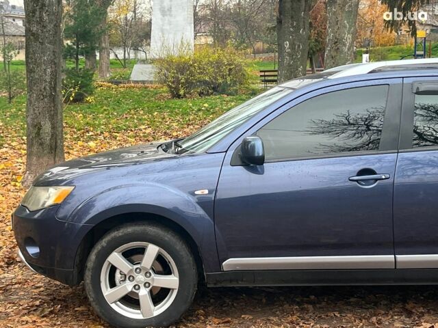 Синій Міцубісі Аутлендер, об'ємом двигуна 2.4 л та пробігом 211 тис. км за 8390 $, фото 5 на Automoto.ua