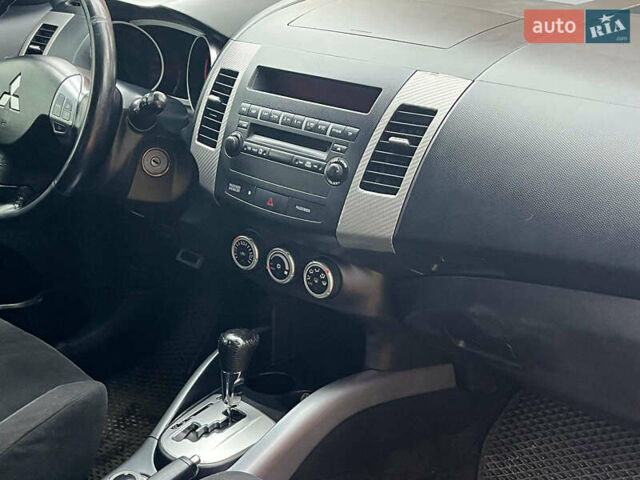 Синій Міцубісі Аутлендер, об'ємом двигуна 2.4 л та пробігом 211 тис. км за 8390 $, фото 16 на Automoto.ua