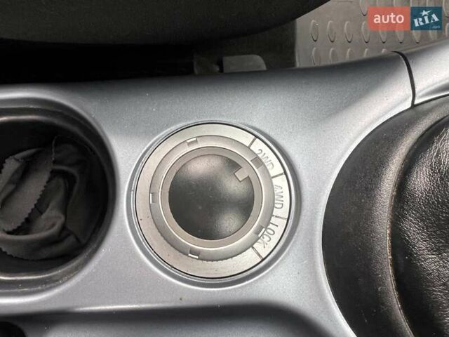 Синий Мицубиси Аутлендер, объемом двигателя 2.4 л и пробегом 94 тыс. км за 8800 $, фото 6 на Automoto.ua