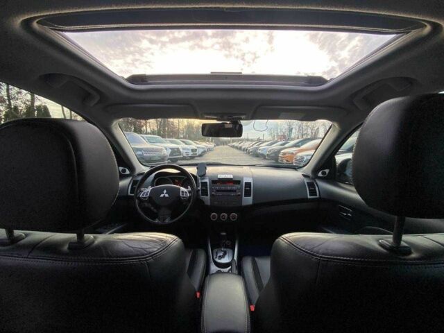 Синий Мицубиси Аутлендер, объемом двигателя 2.4 л и пробегом 282 тыс. км за 9490 $, фото 23 на Automoto.ua