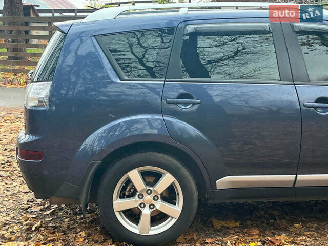Синій Міцубісі Аутлендер, об'ємом двигуна 2.4 л та пробігом 211 тис. км за 8390 $, фото 12 на Automoto.ua