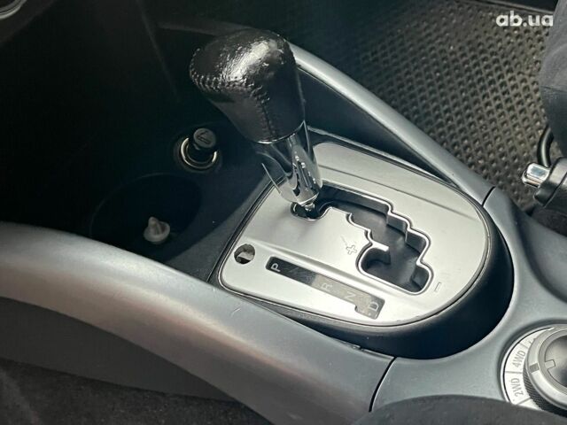 Синій Міцубісі Аутлендер, об'ємом двигуна 2.4 л та пробігом 211 тис. км за 8390 $, фото 32 на Automoto.ua