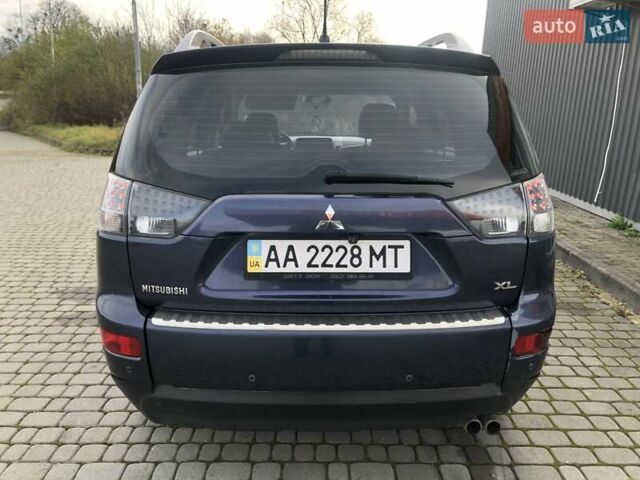 Синий Мицубиси Аутлендер, объемом двигателя 3 л и пробегом 340 тыс. км за 9555 $, фото 13 на Automoto.ua