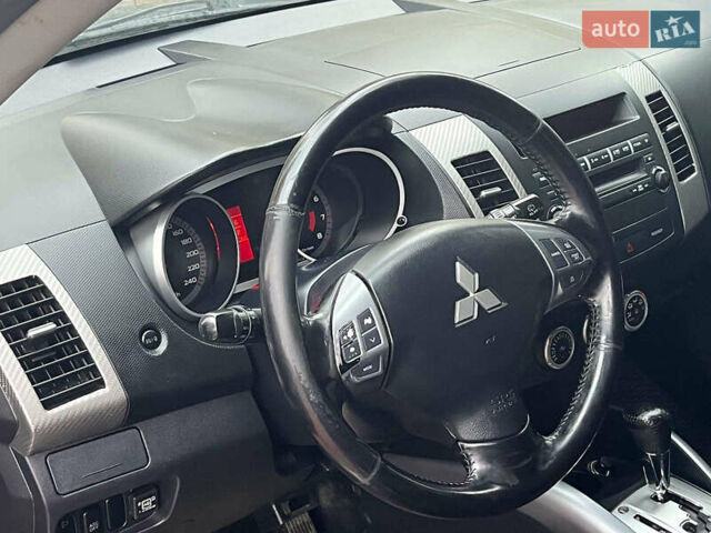 Синій Міцубісі Аутлендер, об'ємом двигуна 2.4 л та пробігом 211 тис. км за 8390 $, фото 28 на Automoto.ua