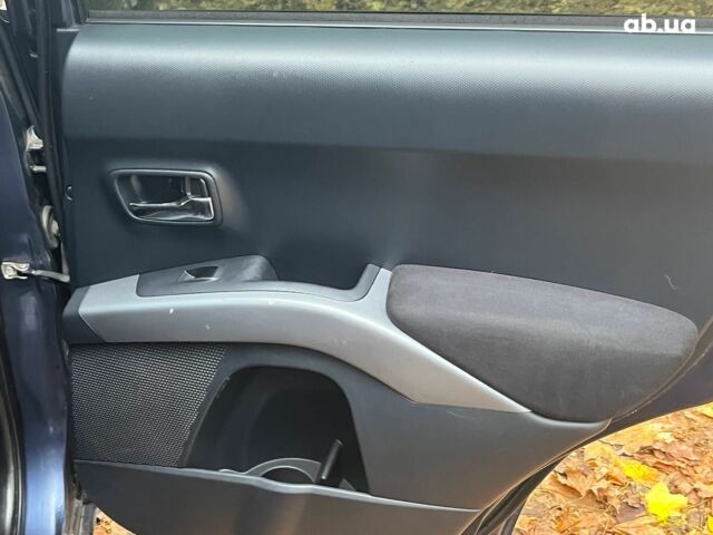 Синій Міцубісі Аутлендер, об'ємом двигуна 2.4 л та пробігом 211 тис. км за 8390 $, фото 22 на Automoto.ua