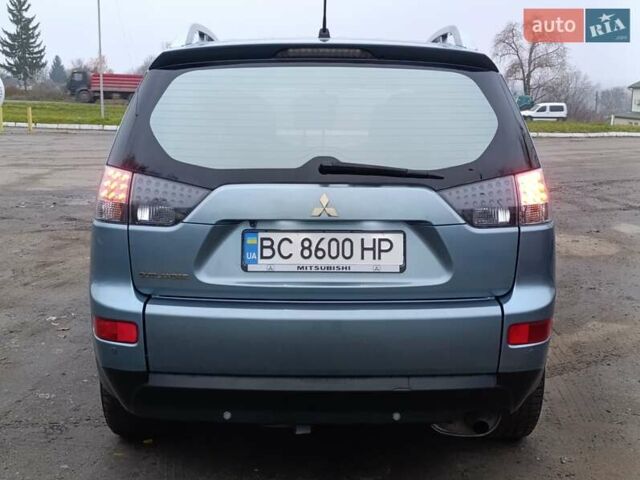 Синий Мицубиси Аутлендер, объемом двигателя 2.4 л и пробегом 264 тыс. км за 7555 $, фото 11 на Automoto.ua