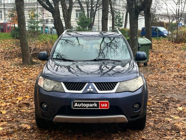 Синій Міцубісі Аутлендер, об'ємом двигуна 2.4 л та пробігом 211 тис. км за 8390 $, фото 1 на Automoto.ua