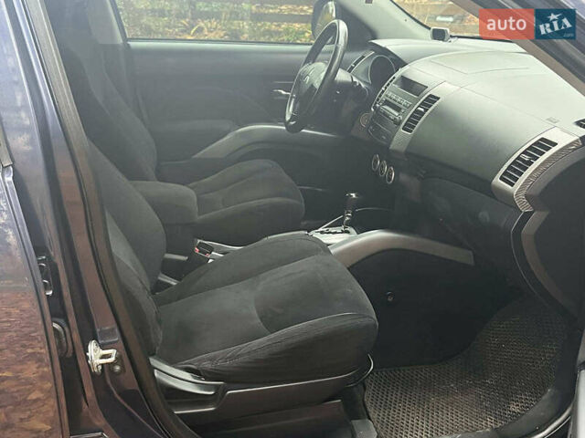 Синій Міцубісі Аутлендер, об'ємом двигуна 2.4 л та пробігом 211 тис. км за 8390 $, фото 14 на Automoto.ua