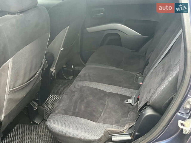 Синій Міцубісі Аутлендер, об'ємом двигуна 2.4 л та пробігом 211 тис. км за 8390 $, фото 24 на Automoto.ua