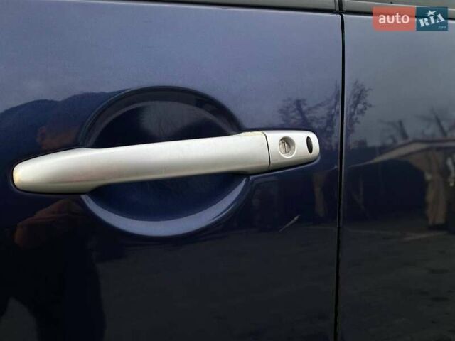 Синій Міцубісі Аутлендер, об'ємом двигуна 2.36 л та пробігом 282 тис. км за 9490 $, фото 15 на Automoto.ua