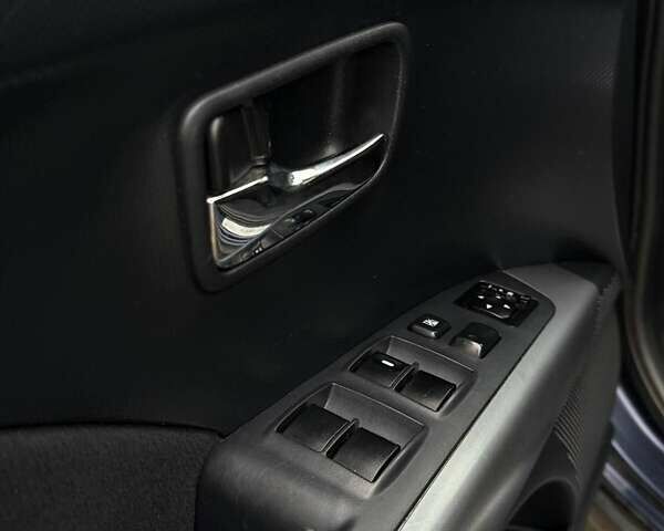 Синий Мицубиси Аутлендер, объемом двигателя 2.4 л и пробегом 211 тыс. км за 7800 $, фото 12 на Automoto.ua