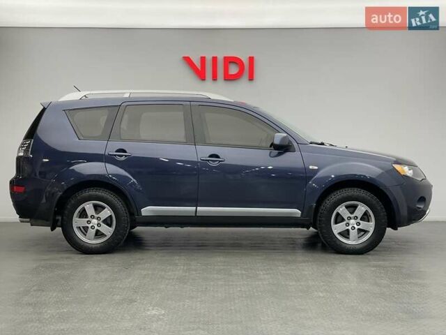 Синій Міцубісі Аутлендер, об'ємом двигуна 2.4 л та пробігом 126 тис. км за 10438 $, фото 3 на Automoto.ua