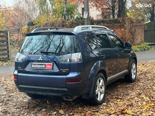 Синій Міцубісі Аутлендер, об'ємом двигуна 2.4 л та пробігом 211 тис. км за 8390 $, фото 9 на Automoto.ua
