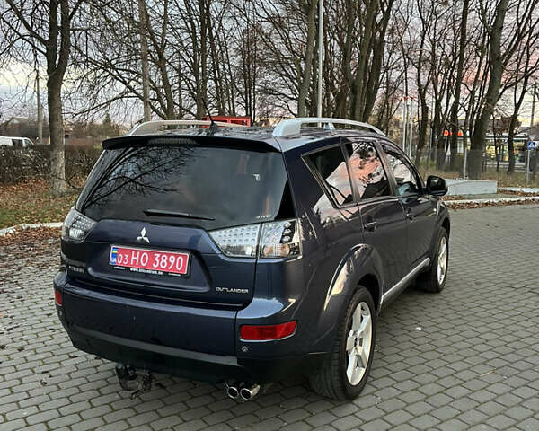 Синий Мицубиси Аутлендер, объемом двигателя 2 л и пробегом 263 тыс. км за 8900 $, фото 5 на Automoto.ua