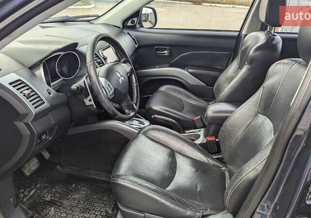 Синий Мицубиси Аутлендер, объемом двигателя 3 л и пробегом 382 тыс. км за 8200 $, фото 14 на Automoto.ua