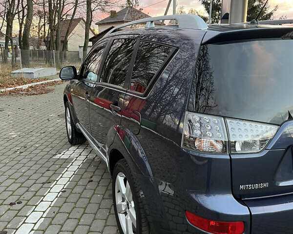 Синий Мицубиси Аутлендер, объемом двигателя 2 л и пробегом 263 тыс. км за 8900 $, фото 8 на Automoto.ua