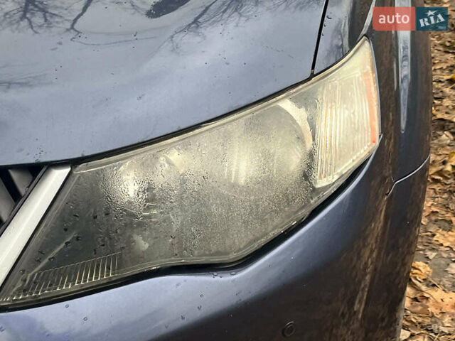 Синій Міцубісі Аутлендер, об'ємом двигуна 2.4 л та пробігом 211 тис. км за 8390 $, фото 4 на Automoto.ua