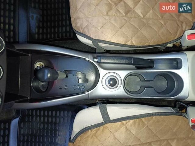 Синий Мицубиси Аутлендер, объемом двигателя 2.4 л и пробегом 264 тыс. км за 7555 $, фото 23 на Automoto.ua