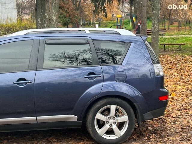 Синій Міцубісі Аутлендер, об'ємом двигуна 2.4 л та пробігом 211 тис. км за 8390 $, фото 6 на Automoto.ua