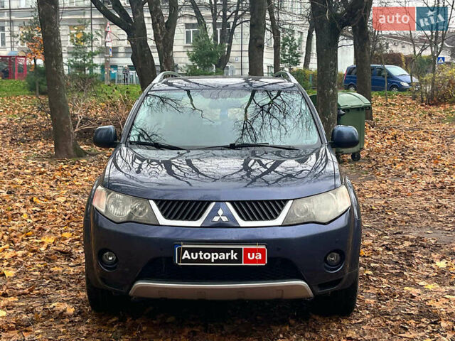Синій Міцубісі Аутлендер, об'ємом двигуна 2.4 л та пробігом 211 тис. км за 8390 $, фото 1 на Automoto.ua