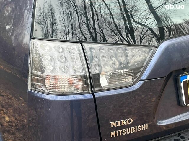 Синій Міцубісі Аутлендер, об'ємом двигуна 2.4 л та пробігом 211 тис. км за 8390 $, фото 11 на Automoto.ua