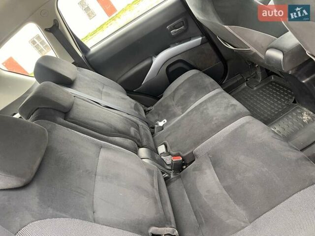 Синий Мицубиси Аутлендер, объемом двигателя 2.4 л и пробегом 94 тыс. км за 8800 $, фото 15 на Automoto.ua