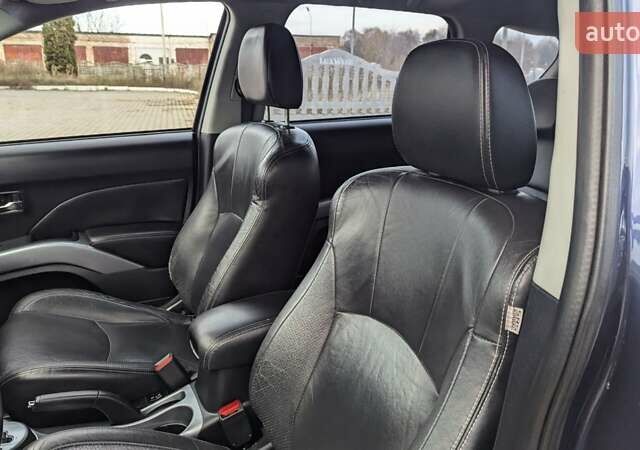 Синий Мицубиси Аутлендер, объемом двигателя 3 л и пробегом 382 тыс. км за 8200 $, фото 11 на Automoto.ua