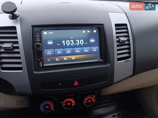 Синий Мицубиси Аутлендер, объемом двигателя 2.4 л и пробегом 264 тыс. км за 7555 $, фото 25 на Automoto.ua