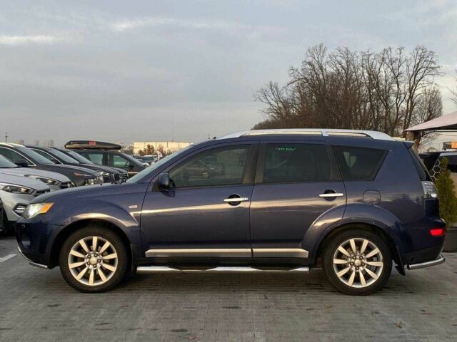 Синий Мицубиси Аутлендер, объемом двигателя 2.4 л и пробегом 282 тыс. км за 9490 $, фото 7 на Automoto.ua